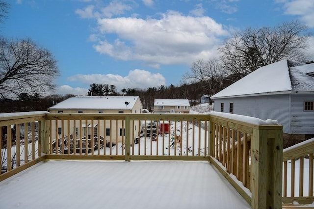 view of snow covered deck