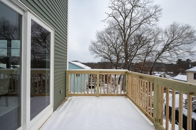 wooden balcony featuring a deck