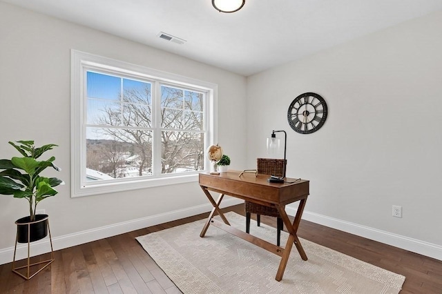 office space featuring dark wood-type flooring