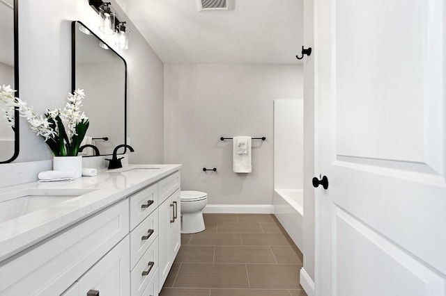 full bathroom featuring vanity, shower / bathing tub combination, and toilet