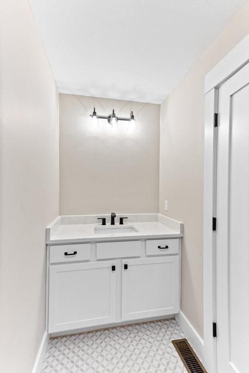 41 Kent St, Brockton, MA 02302 - bathroom featuring tile patterned floors and vanity