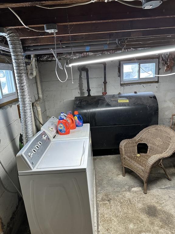 basement featuring washing machine and clothes dryer