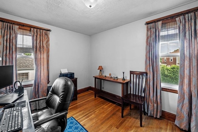 11 Raymond Rd Unit 2, Salem, MA 01970 - office area featuring wood finished floors and a textured ceiling