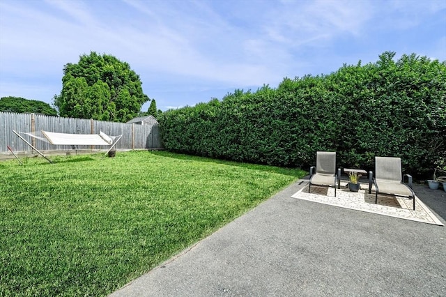 11 Raymond Rd Unit 2, Salem, MA 01970 - fenced backyard featuring a patio