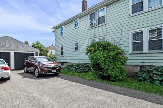 11 Raymond Rd Unit 2, Salem, MA 01970 - view of side of property with a chimney