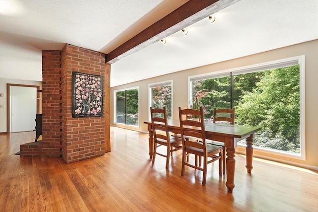 237 Shutesbury Rd, Amherst, MA 01002 - dining area with wood finished floors and a wood stove