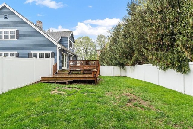view of yard with a deck