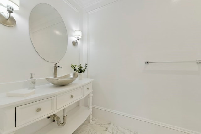 bathroom featuring ornamental molding, tile patterned floors, and vanity