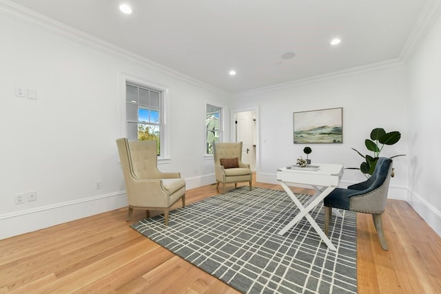 home office with hardwood / wood-style flooring and crown molding