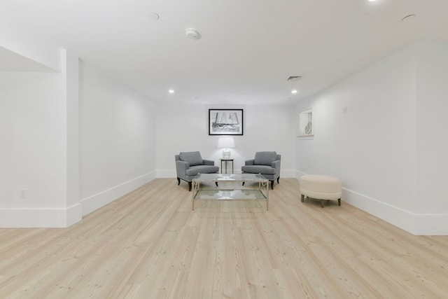 sitting room featuring light wood-type flooring