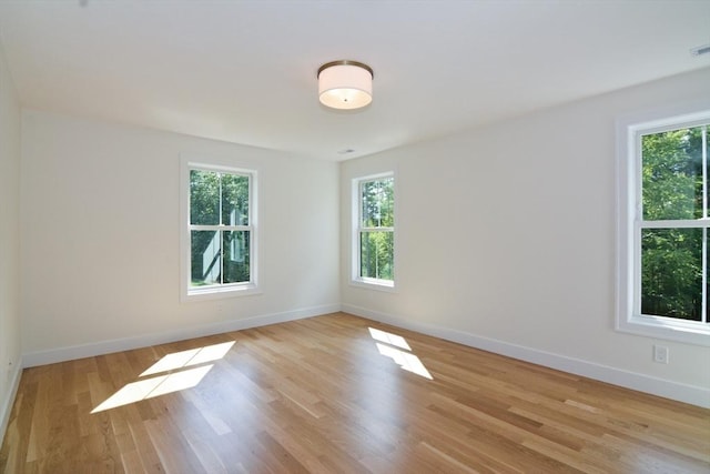 empty room featuring light hardwood / wood-style floors