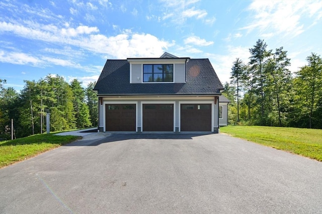 garage with a yard