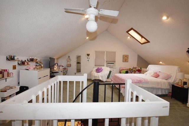 1559 Bay St Unit 53, Taunton, MA 02780 - bedroom featuring a skylight, vaulted ceiling, carpet flooring, and ceiling fan