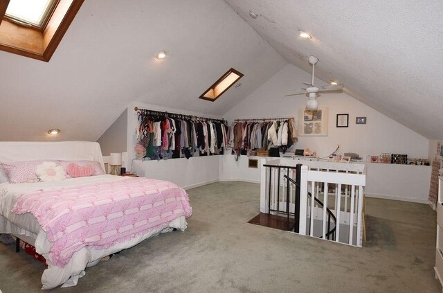 1559 Bay St Unit 53, Taunton, MA 02780 - carpeted bedroom featuring vaulted ceiling, baseboards, a skylight, a ceiling fan, and recessed lighting