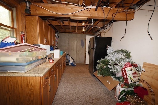 1559 Bay St Unit 53, Taunton, MA 02780 - below grade area with freestanding refrigerator and light carpet