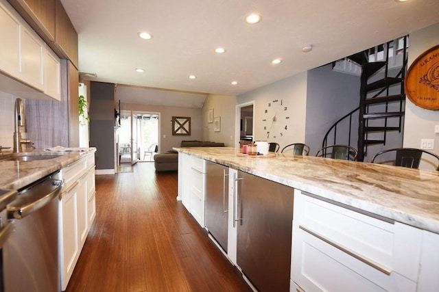 1559 Bay St Unit 53, Taunton, MA 02780 - kitchen with a sink, dishwasher, recessed lighting, light stone counters, and dark wood finished floors