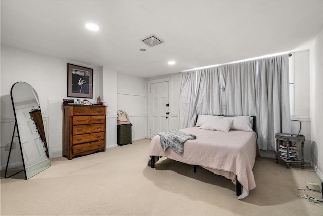 bedroom featuring recessed lighting, visible vents, and light colored carpet