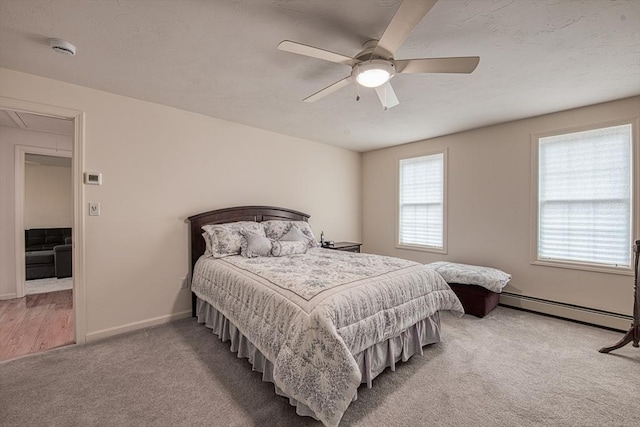 227 Village St, Millis, MA 02054 - bedroom featuring carpet floors, a baseboard radiator, multiple windows, and attic access