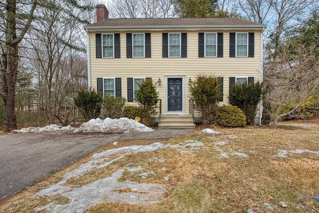 227 Village St, Millis, MA 02054 - colonial home featuring entry steps and a chimney