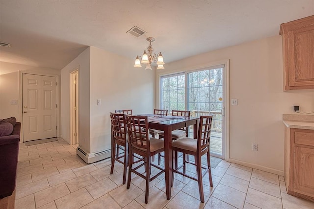 227 Village St, Millis, MA 02054 - dining room with light tile patterned floors, visible vents, baseboards, and an inviting chandelier