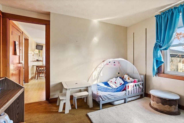 bedroom featuring carpet flooring