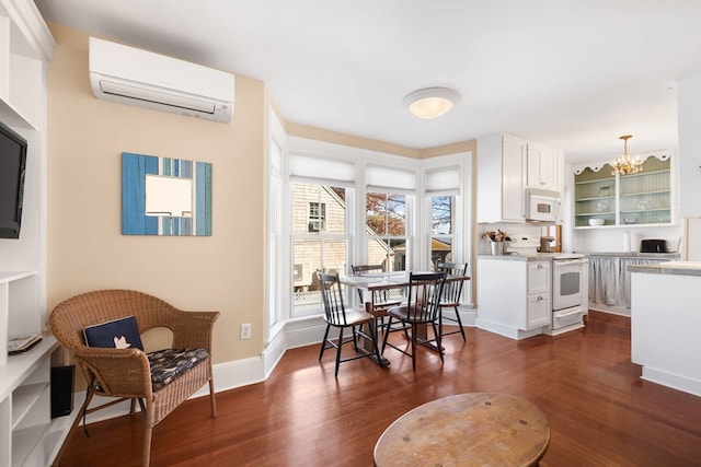 interior space featuring a wall mounted AC, dark wood-type flooring, and a chandelier