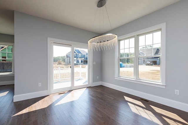 19 Sycamore Way Lot 40, Medway, MA 02053 - unfurnished dining area with dark wood-style floors, visible vents, and baseboards
