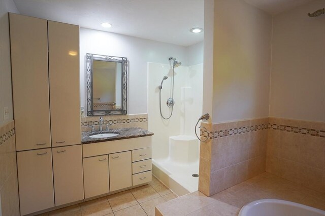 42 Wall St, Middleboro, MA 02346 - bathroom featuring walk in shower, tile patterned floors, vanity, and recessed lighting