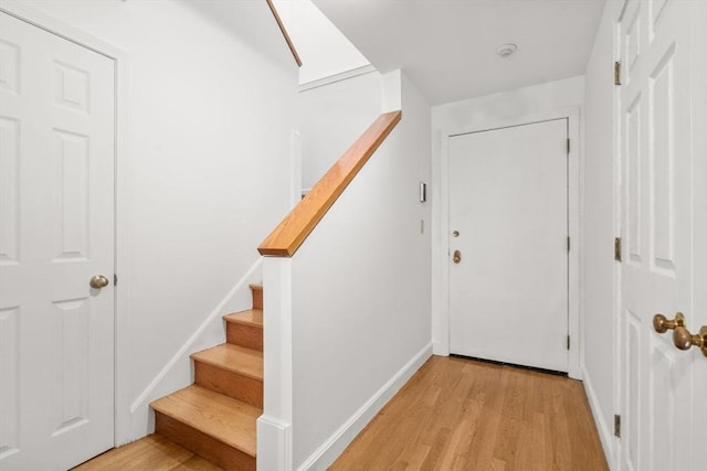 227 Summit Unit W207, Brookline, MA 02446 - stairway with wood finished floors and baseboards