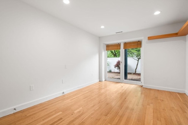 227 Summit Unit W207, Brookline, MA 02446 - unfurnished room featuring baseboards, light wood-style floors, and recessed lighting