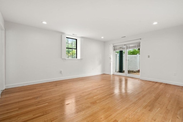 227 Summit Unit W207, Brookline, MA 02446 - empty room featuring healthy amount of natural light, light wood-style flooring, and recessed lighting