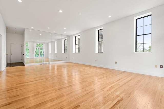 227 Summit Unit W207, Brookline, MA 02446 - unfurnished room featuring light wood-style floors, recessed lighting, and baseboards