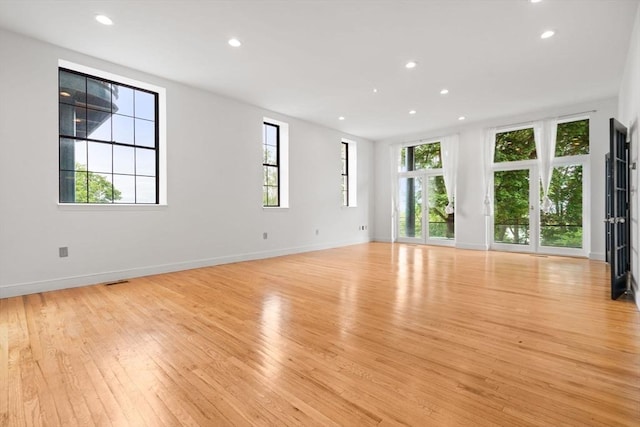 227 Summit Unit W207, Brookline, MA 02446 - spare room featuring recessed lighting, light wood-style flooring, and baseboards