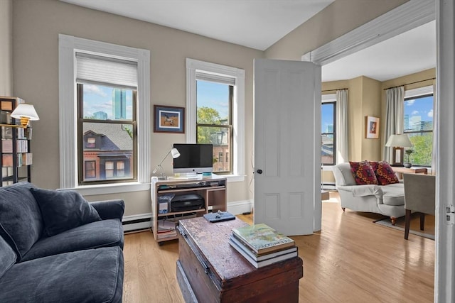258 Shawmut Ave Unit 8, Boston, MA 02118 - living room with light wood-style flooring and a baseboard radiator