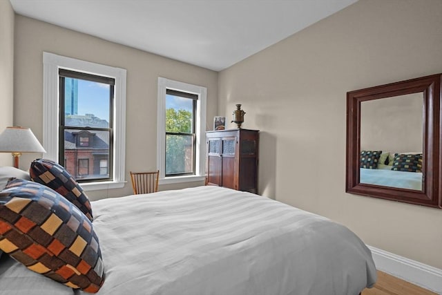 258 Shawmut Ave Unit 8, Boston, MA 02118 - bedroom featuring baseboards and wood finished floors