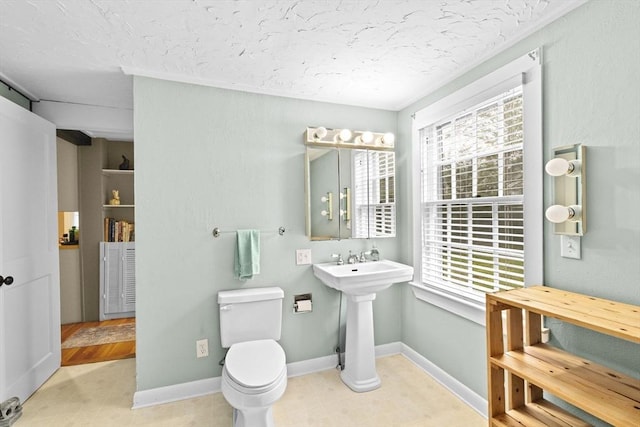 23 Garden Rd, Scituate, MA 02066 - bathroom with a textured ceiling and plenty of natural light