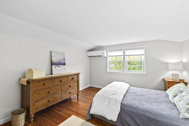 23 Garden Rd, Scituate, MA 02066 - bedroom with a wall mounted air conditioner, dark wood-type flooring, and lofted ceiling