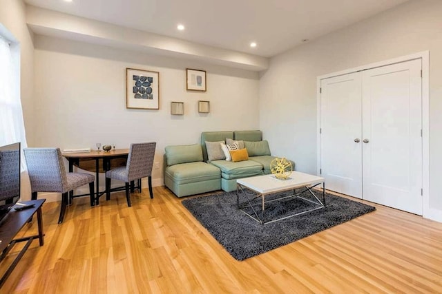 living room featuring recessed lighting and light wood-style flooring