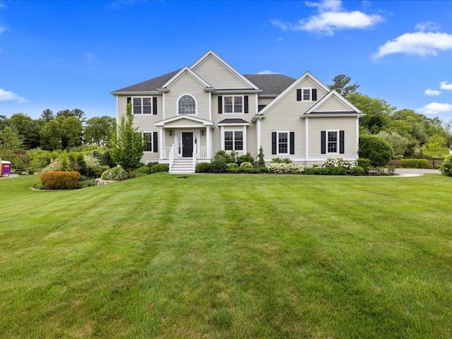 10 Beech St, Millis, MA 02054 - colonial home with a front yard
