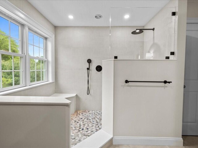 10 Beech St, Millis, MA 02054 - bathroom with plenty of natural light, a walk in shower, recessed lighting, and baseboards