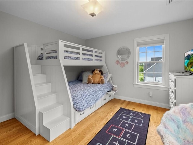 10 Beech St, Millis, MA 02054 - bedroom with light wood-type flooring and baseboards