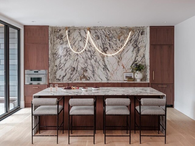 dining room with light hardwood / wood-style floors