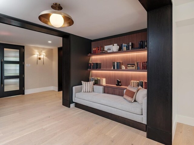 sitting room featuring light hardwood / wood-style floors