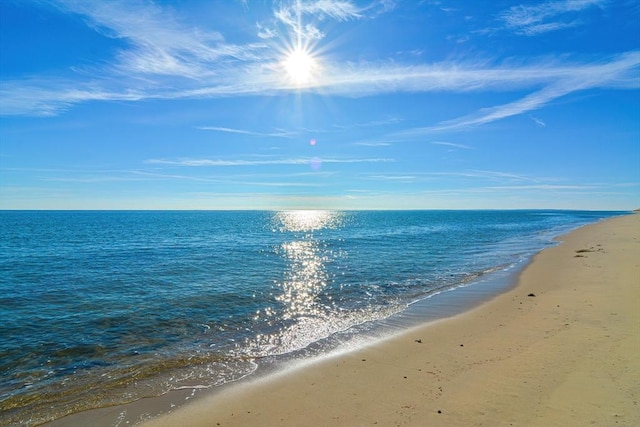 view of water feature with a beach view