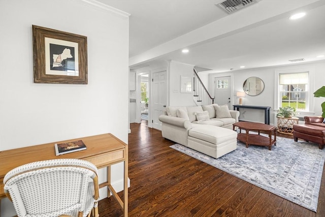 living area with recessed lighting, dark wood finished floors, stairs, and visible vents