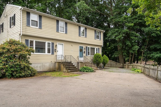 212 Fountain St Unit A, Framingham, MA 01702 - colonial home featuring view of scattered trees
