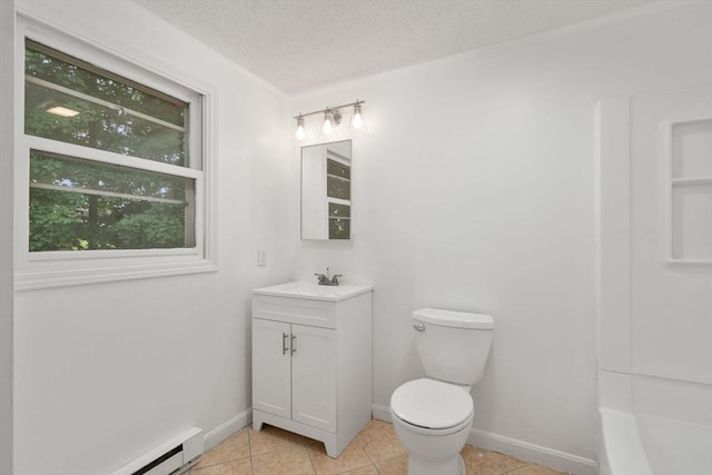 212 Fountain St Unit A, Framingham, MA 01702 - bathroom featuring vanity, tile patterned flooring, baseboard heating, and a textured ceiling