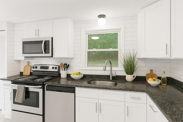 212 Fountain St Unit A, Framingham, MA 01702 - kitchen featuring appliances with stainless steel finishes, white cabinets, and tasteful backsplash