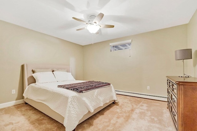 bedroom featuring ceiling fan, a baseboard radiator, and light carpet