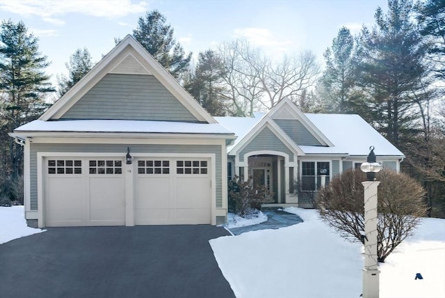 craftsman-style house featuring a garage